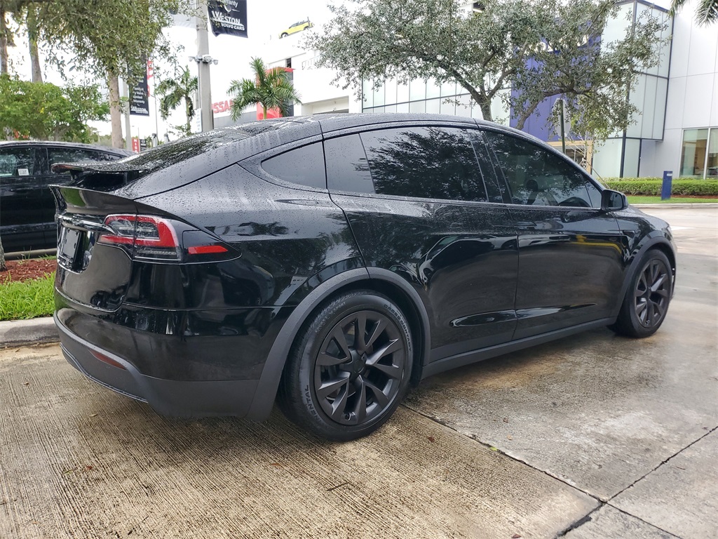 used 2023 Tesla Model X car, priced at $53,695