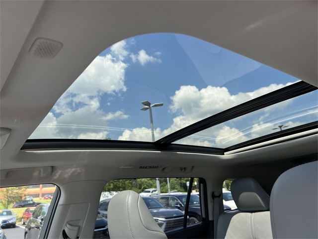 used 2021 Toyota Highlander Hybrid car, priced at $37,440