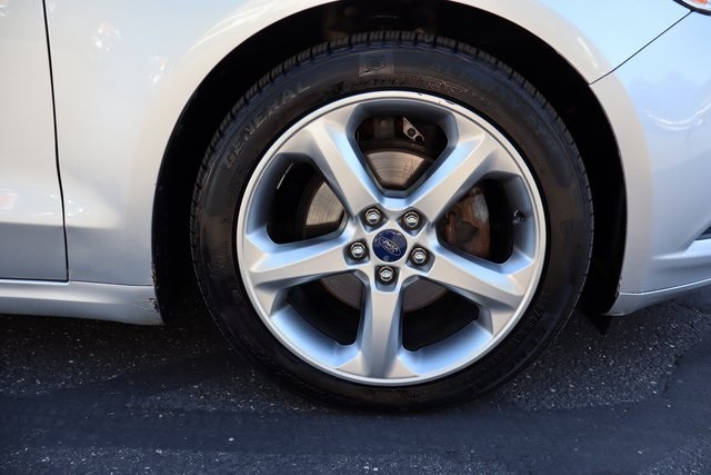 used 2015 Ford Fusion car, priced at $6,900