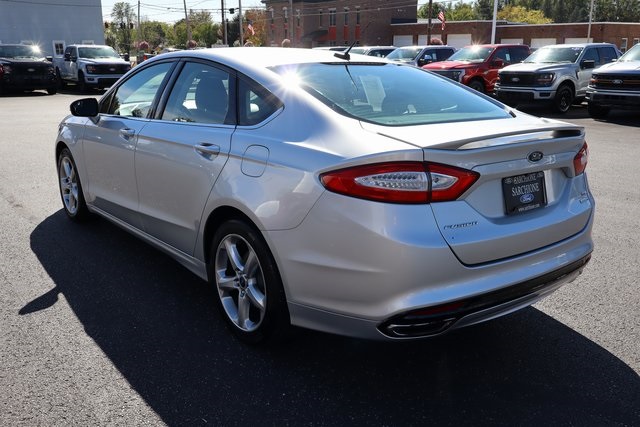 used 2015 Ford Fusion car, priced at $6,900