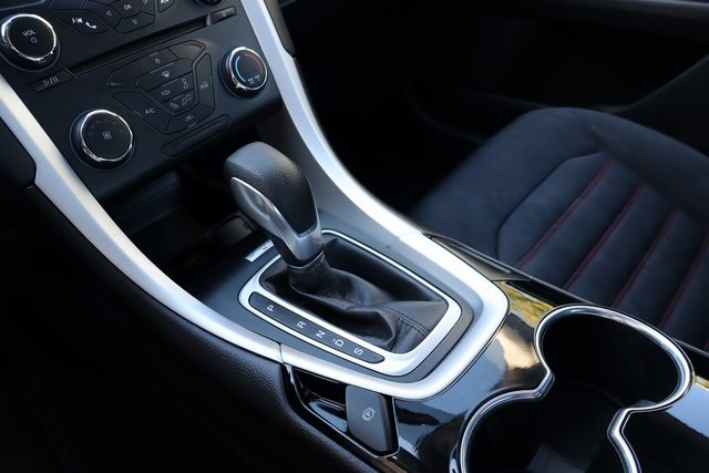 used 2015 Ford Fusion car, priced at $6,900