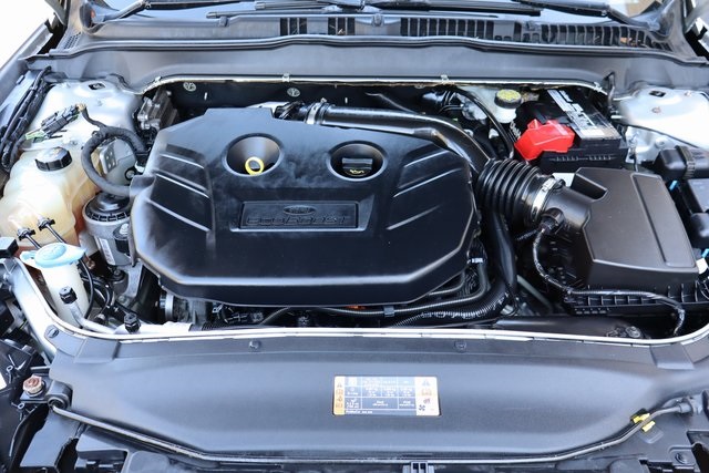 used 2015 Ford Fusion car, priced at $6,900