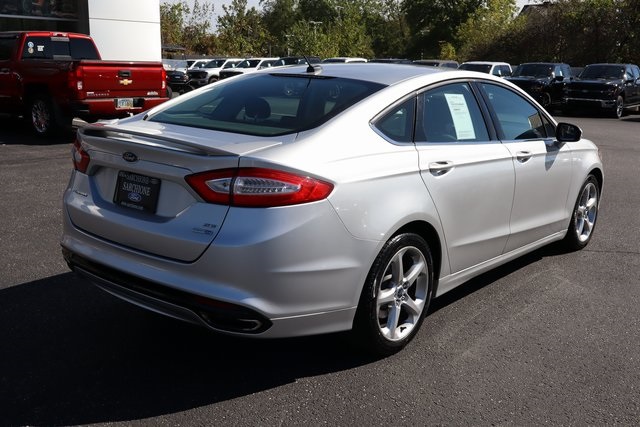 used 2015 Ford Fusion car, priced at $6,900