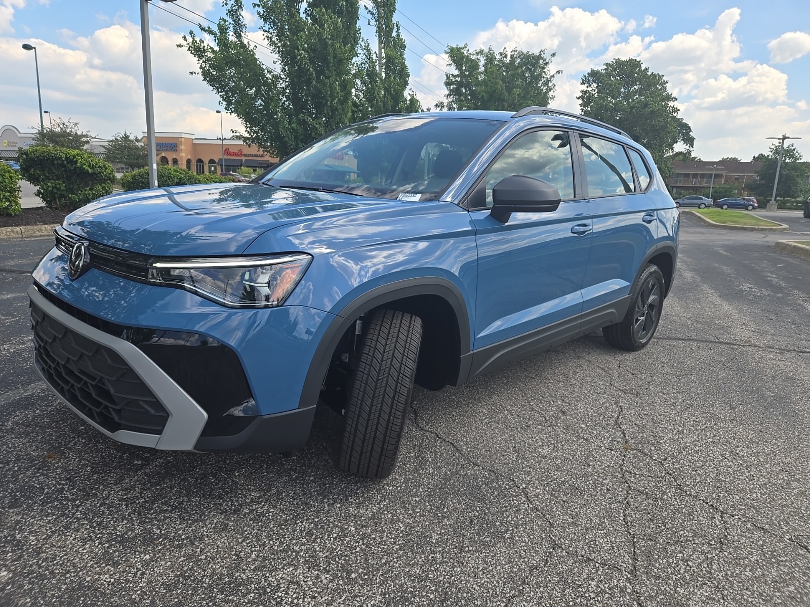 new 2025 Volkswagen Taos car, priced at $25,659