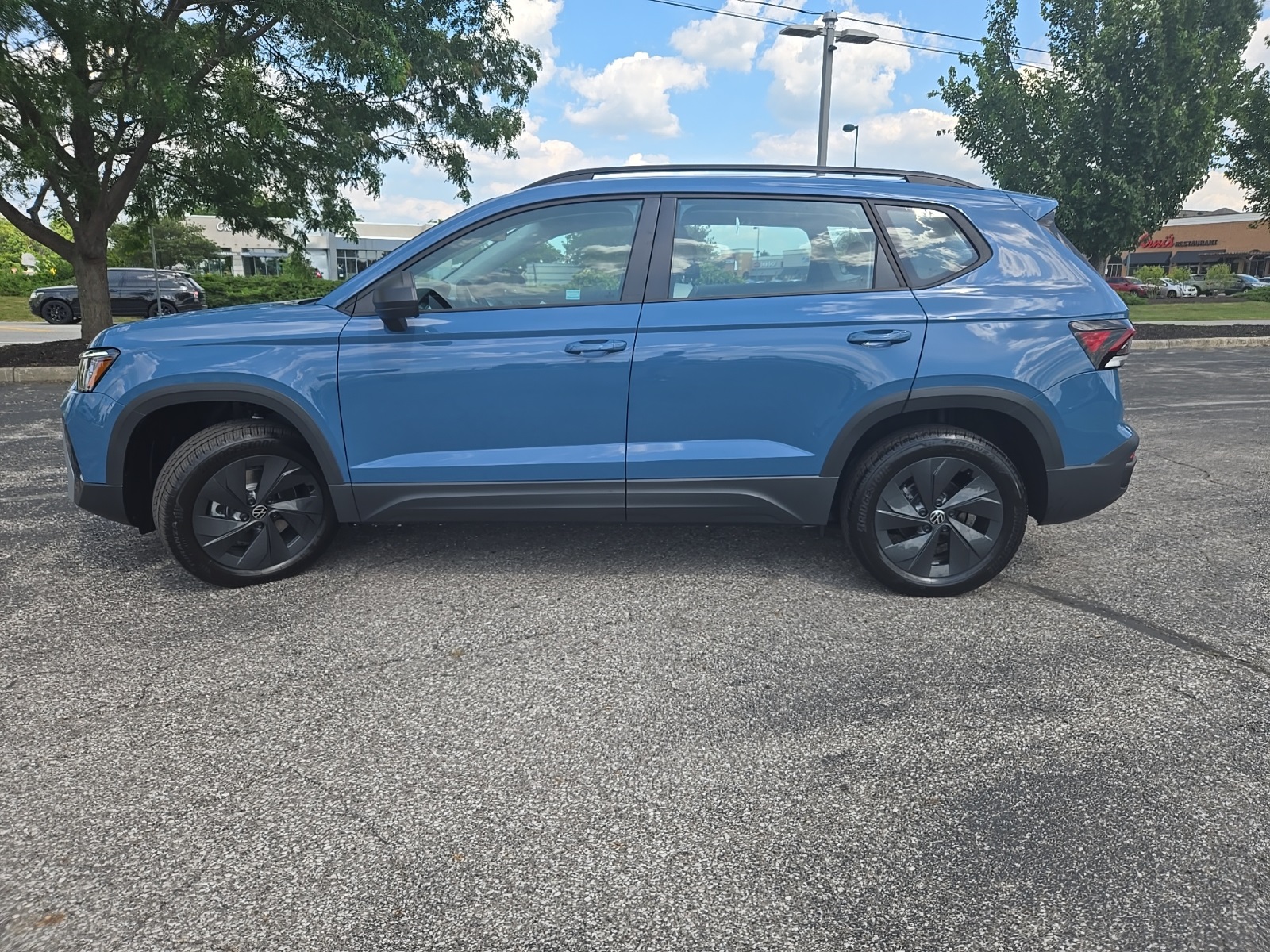 new 2025 Volkswagen Taos car, priced at $25,659