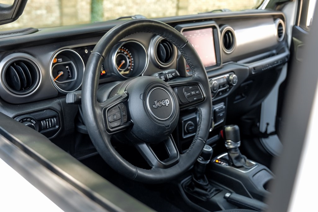 used 2021 Jeep Wrangler car, priced at $34,607