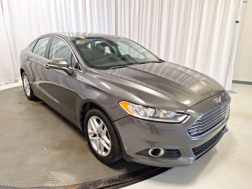 used 2016 Ford Fusion car, priced at $6,999