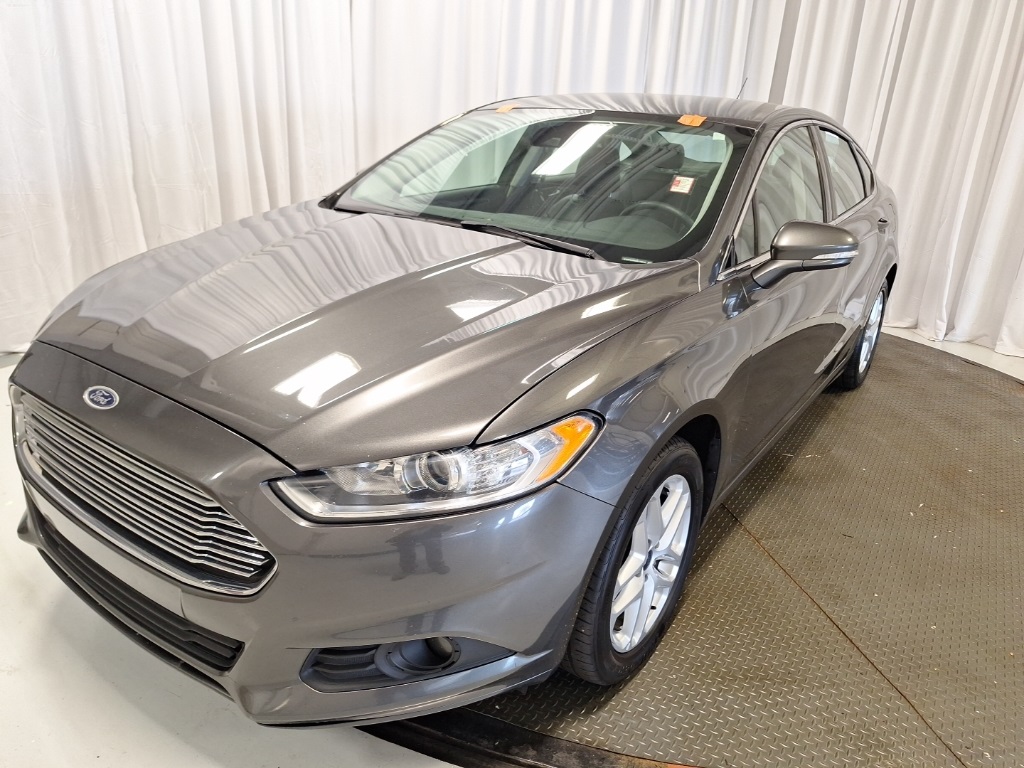used 2016 Ford Fusion car, priced at $6,999