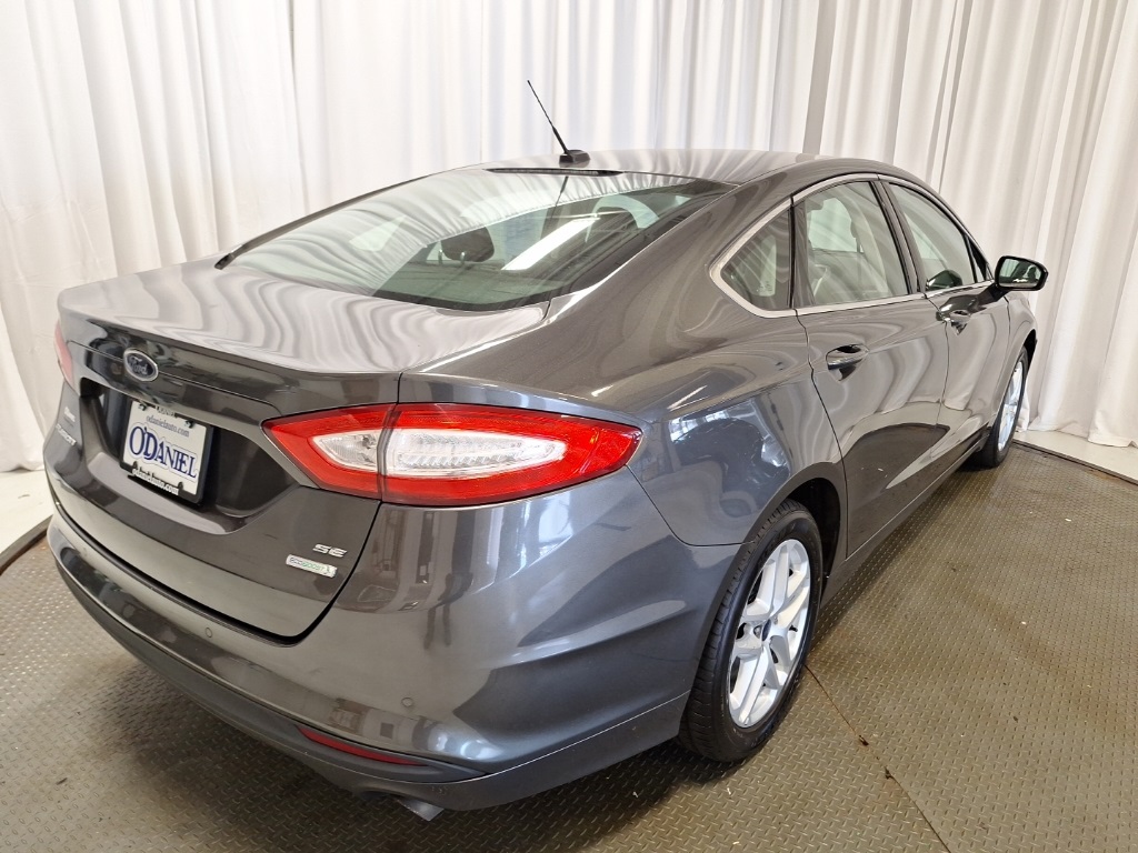 used 2016 Ford Fusion car, priced at $6,999
