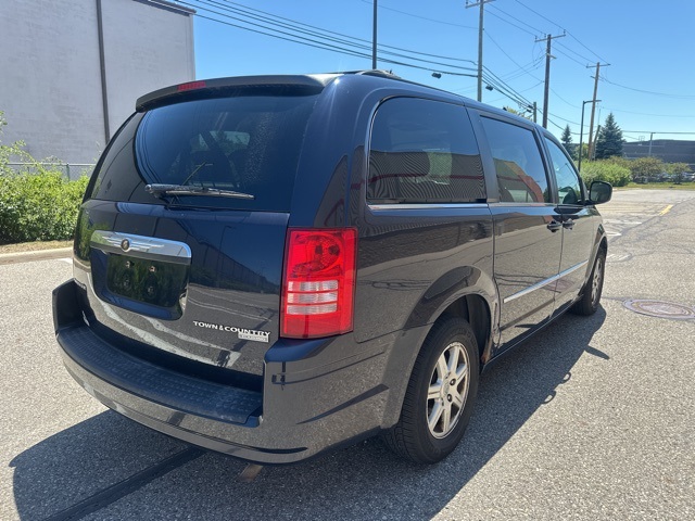 used 2010 Chrysler Town & Country car, priced at $4,998