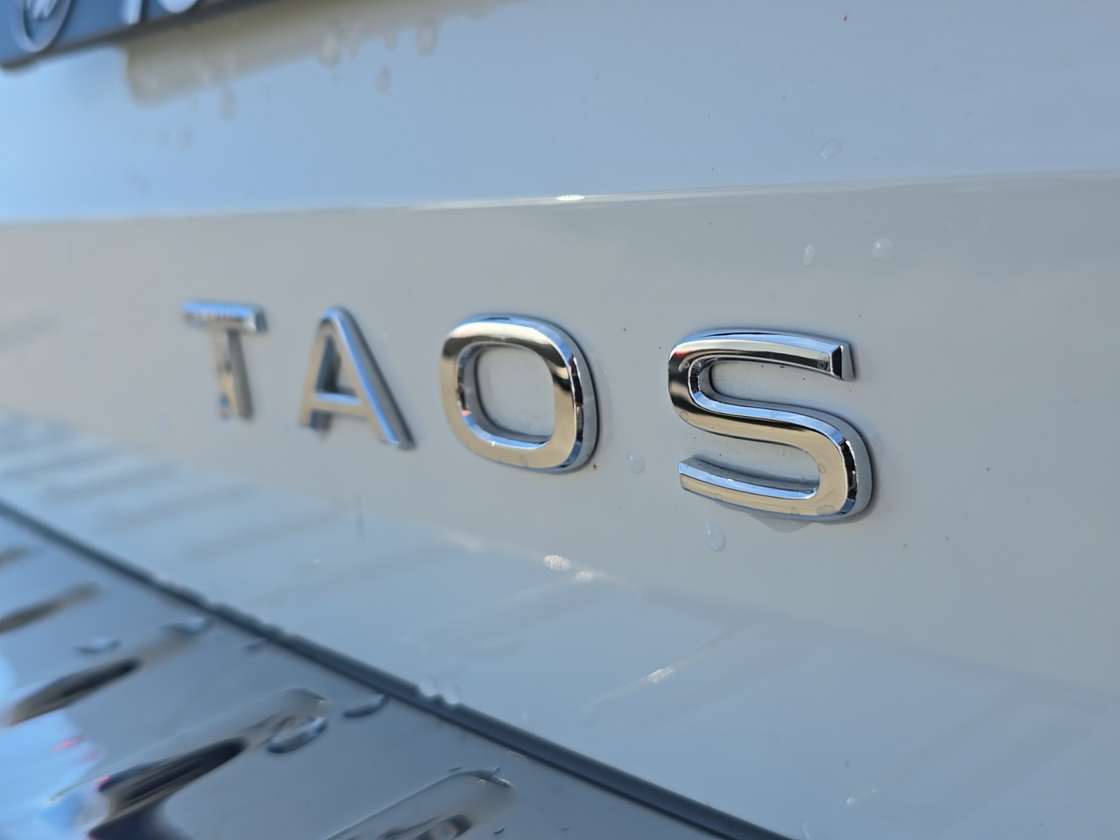 used 2023 Volkswagen Taos car, priced at $21,000