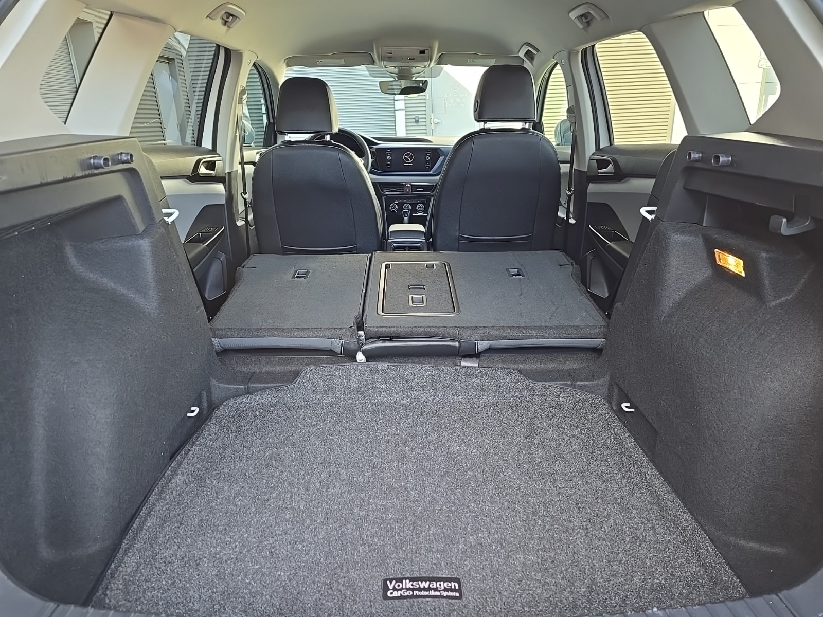 used 2023 Volkswagen Taos car, priced at $21,000