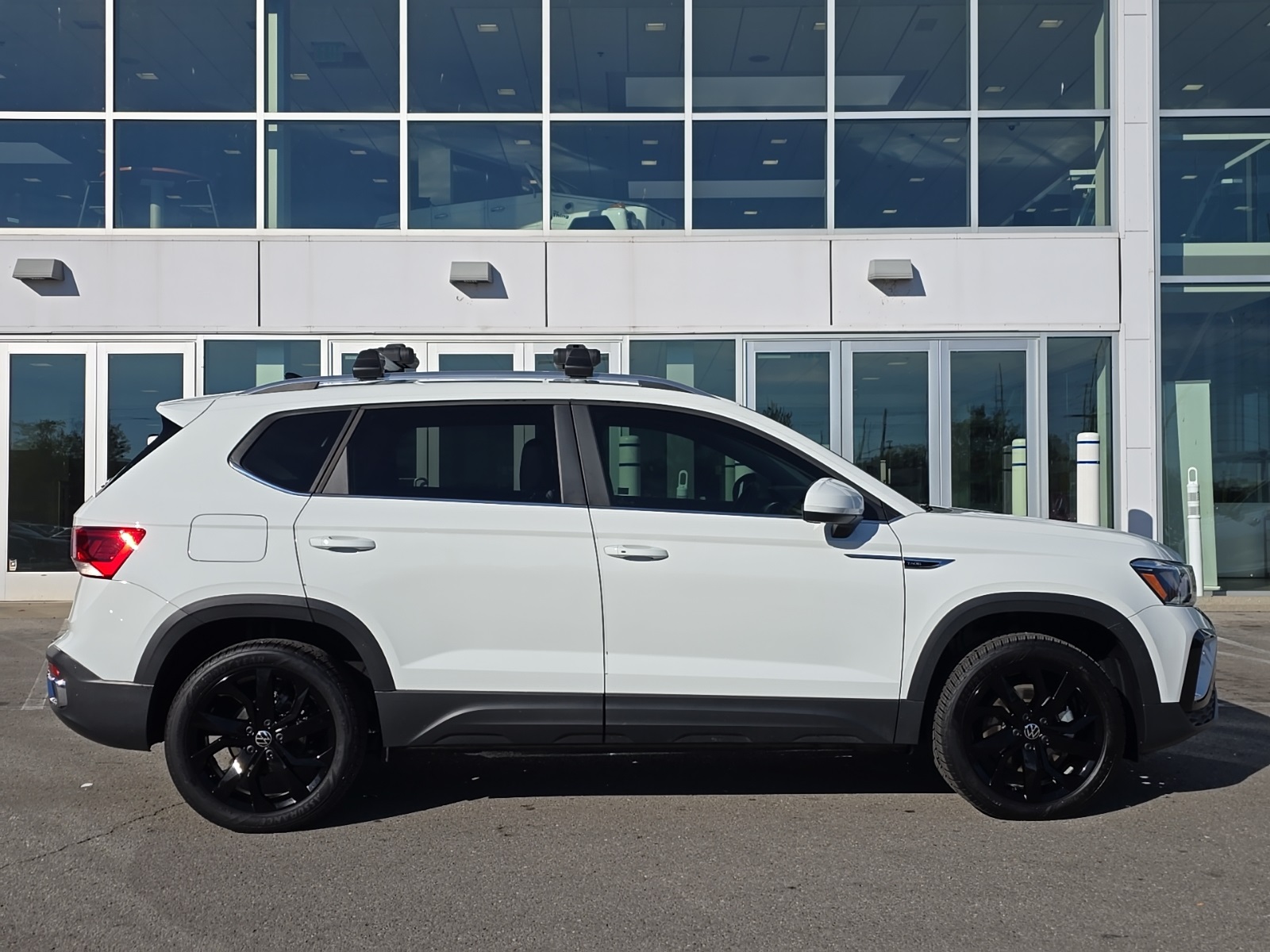 used 2023 Volkswagen Taos car, priced at $21,000