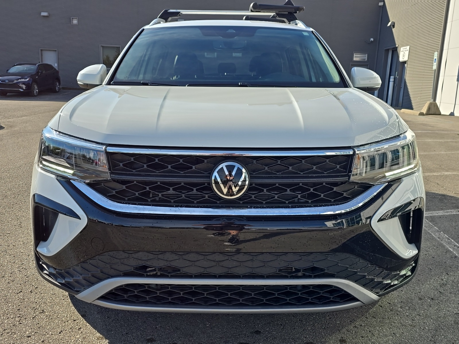 used 2023 Volkswagen Taos car, priced at $21,000