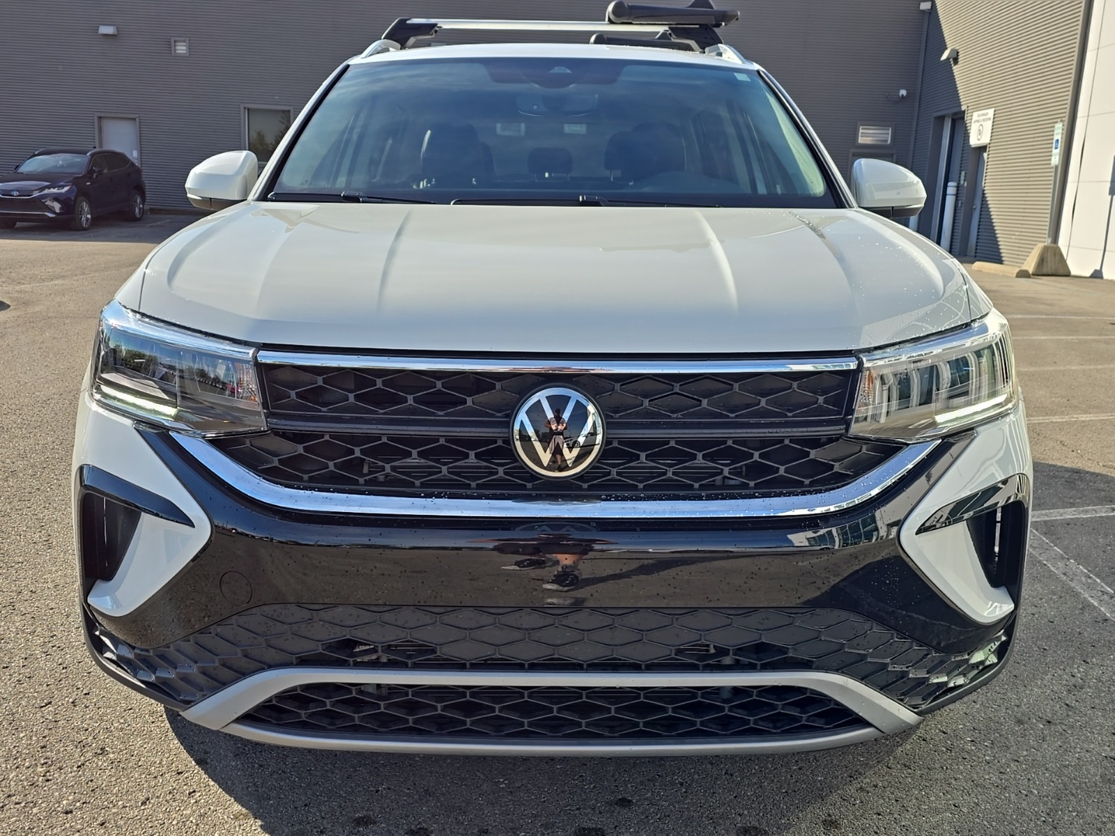 used 2023 Volkswagen Taos car, priced at $21,000