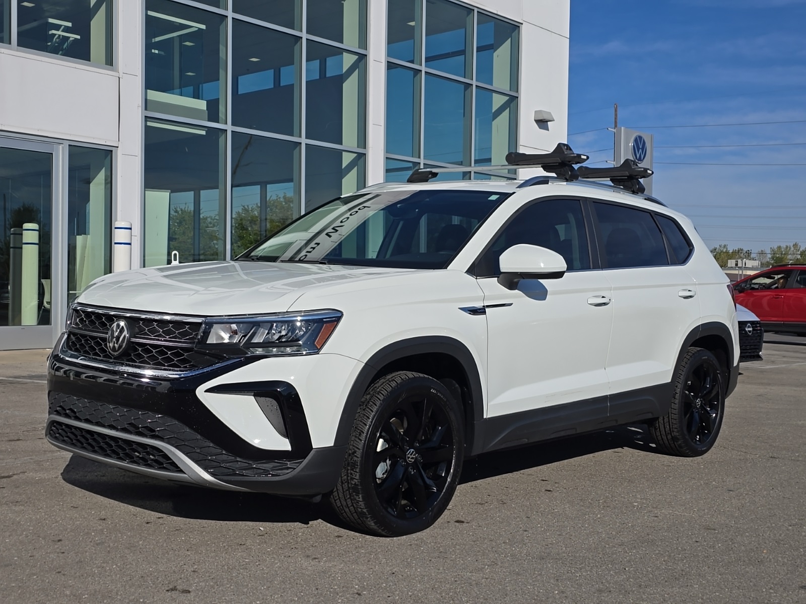 used 2023 Volkswagen Taos car, priced at $21,000