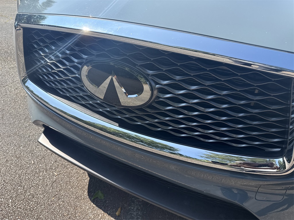 used 2024 INFINITI QX50 car, priced at $32,599