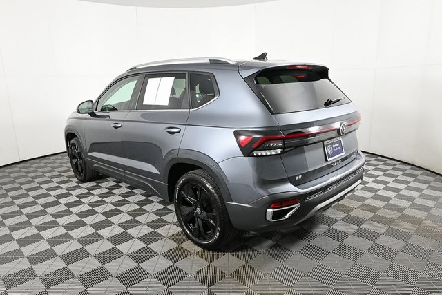 used 2025 Volkswagen Taos car, priced at $24,200