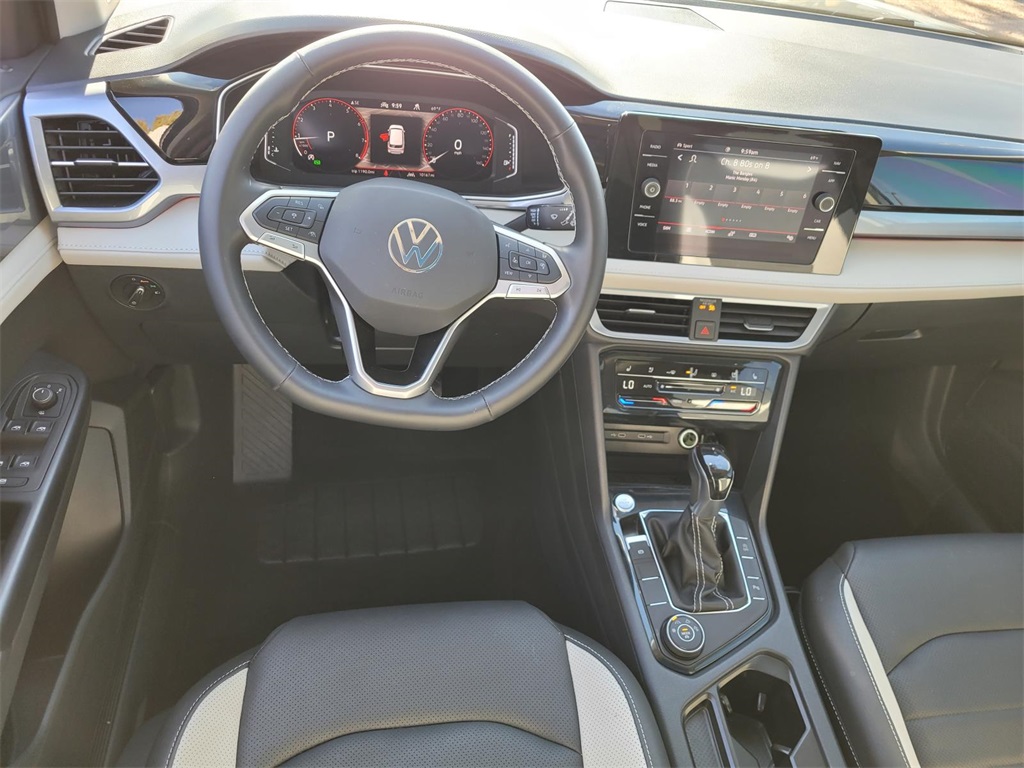 used 2025 Volkswagen Taos car, priced at $30,492