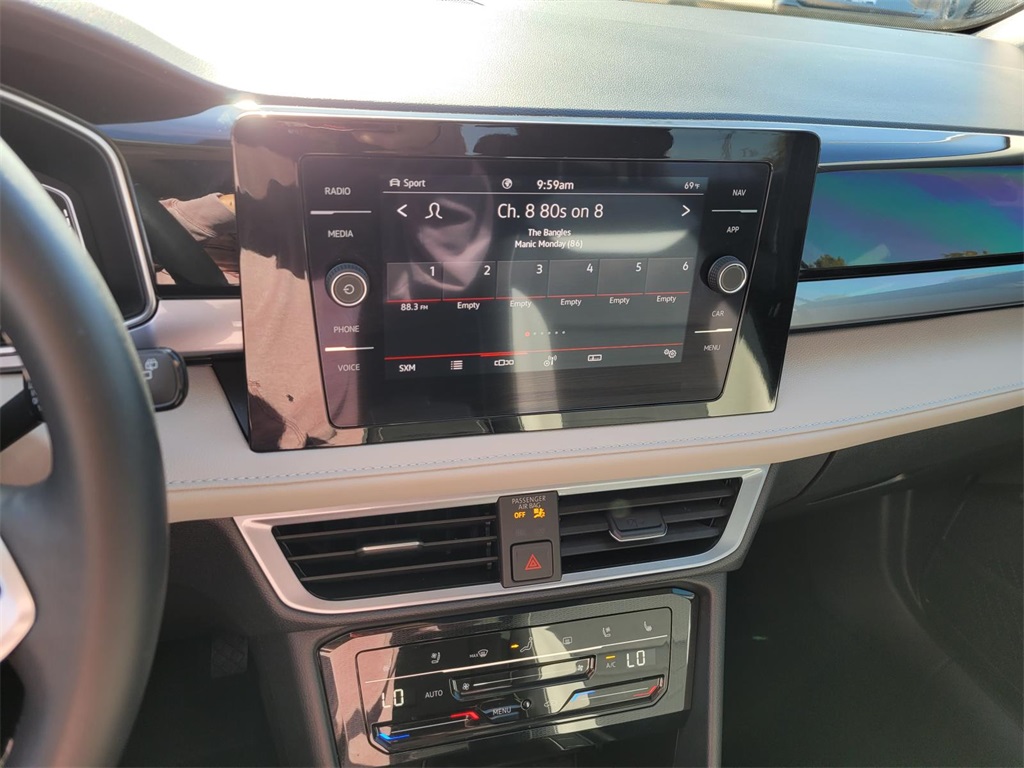 used 2025 Volkswagen Taos car, priced at $30,492