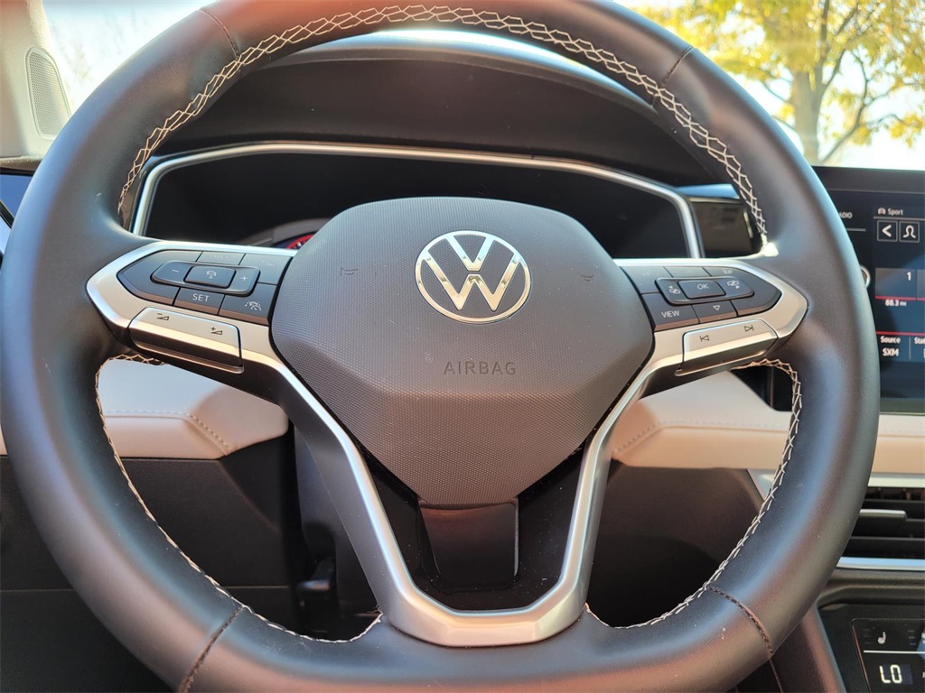 used 2025 Volkswagen Taos car, priced at $30,492