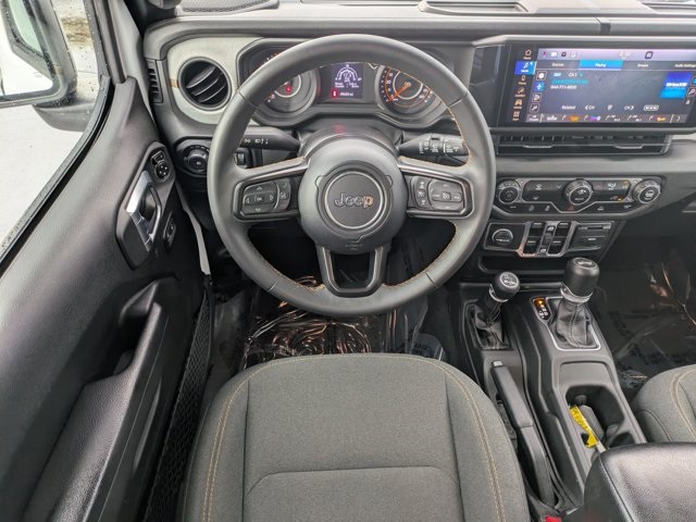 used 2024 Jeep Wrangler car, priced at $32,830