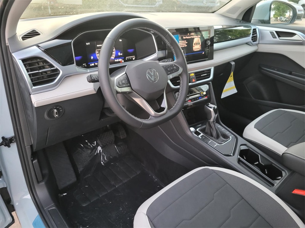new 2025 Volkswagen Taos car, priced at $31,100