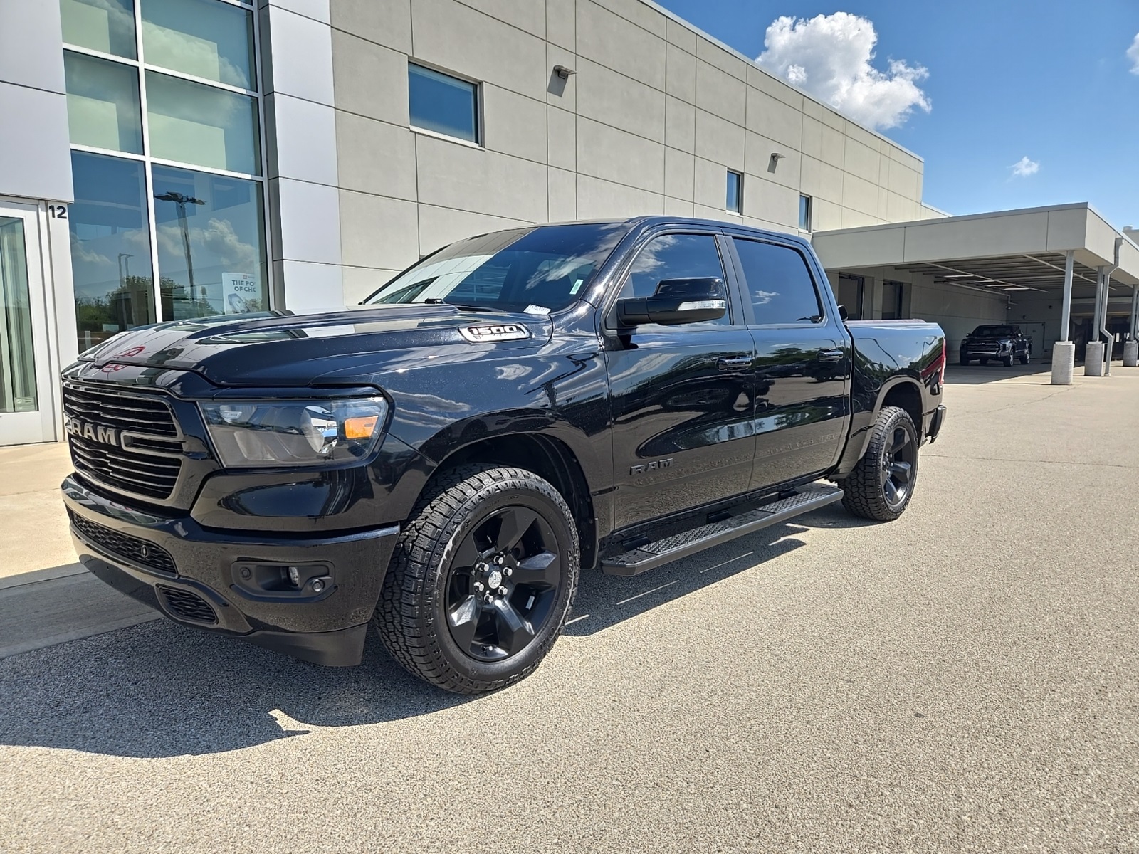 used 2019 Ram 1500 car, priced at $27,068