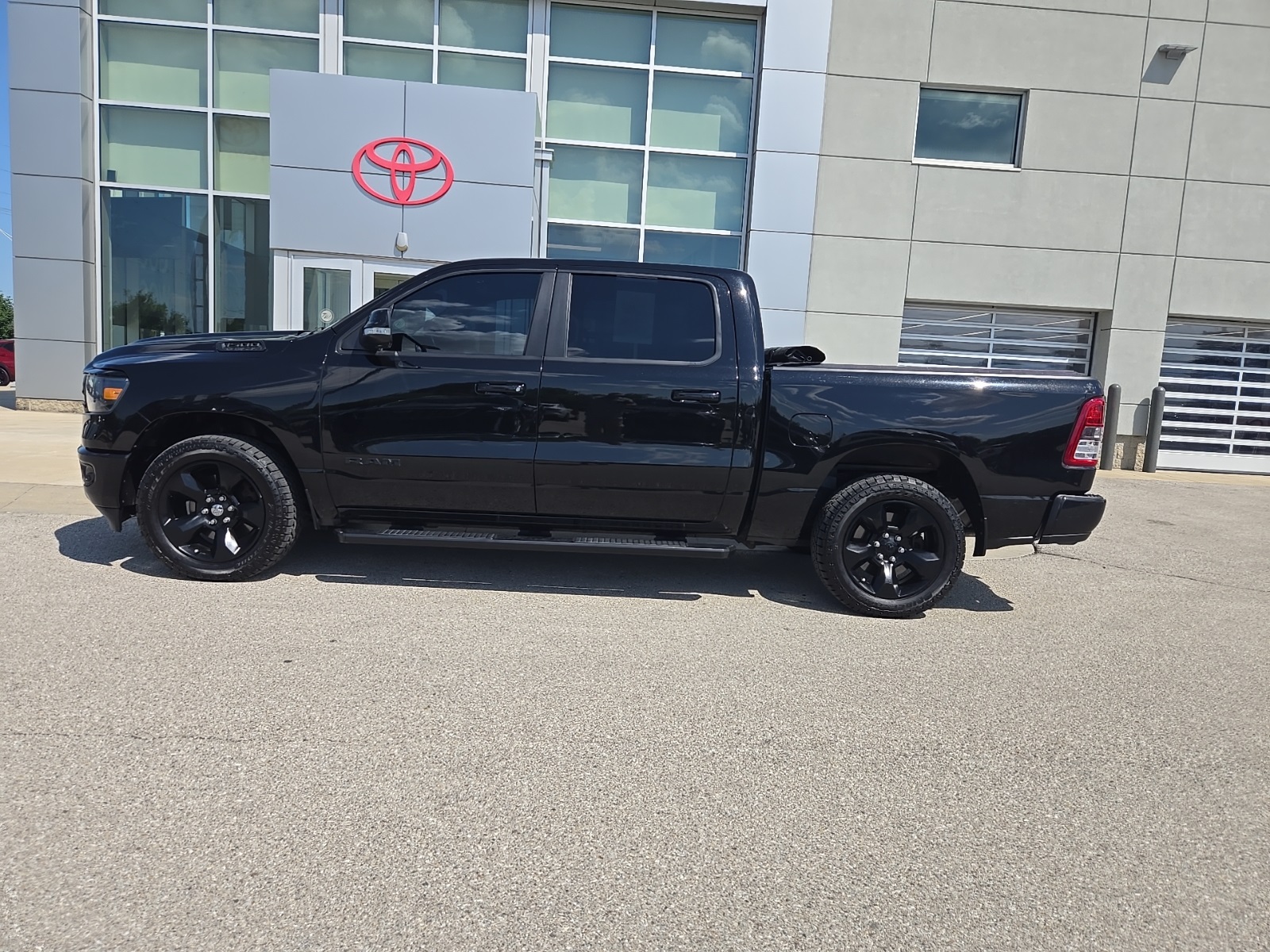 used 2019 Ram 1500 car, priced at $27,068