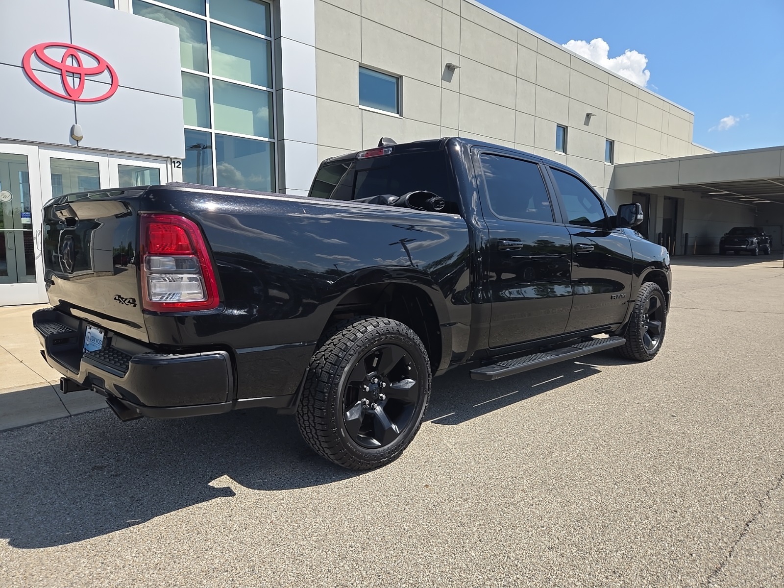 used 2019 Ram 1500 car, priced at $27,068