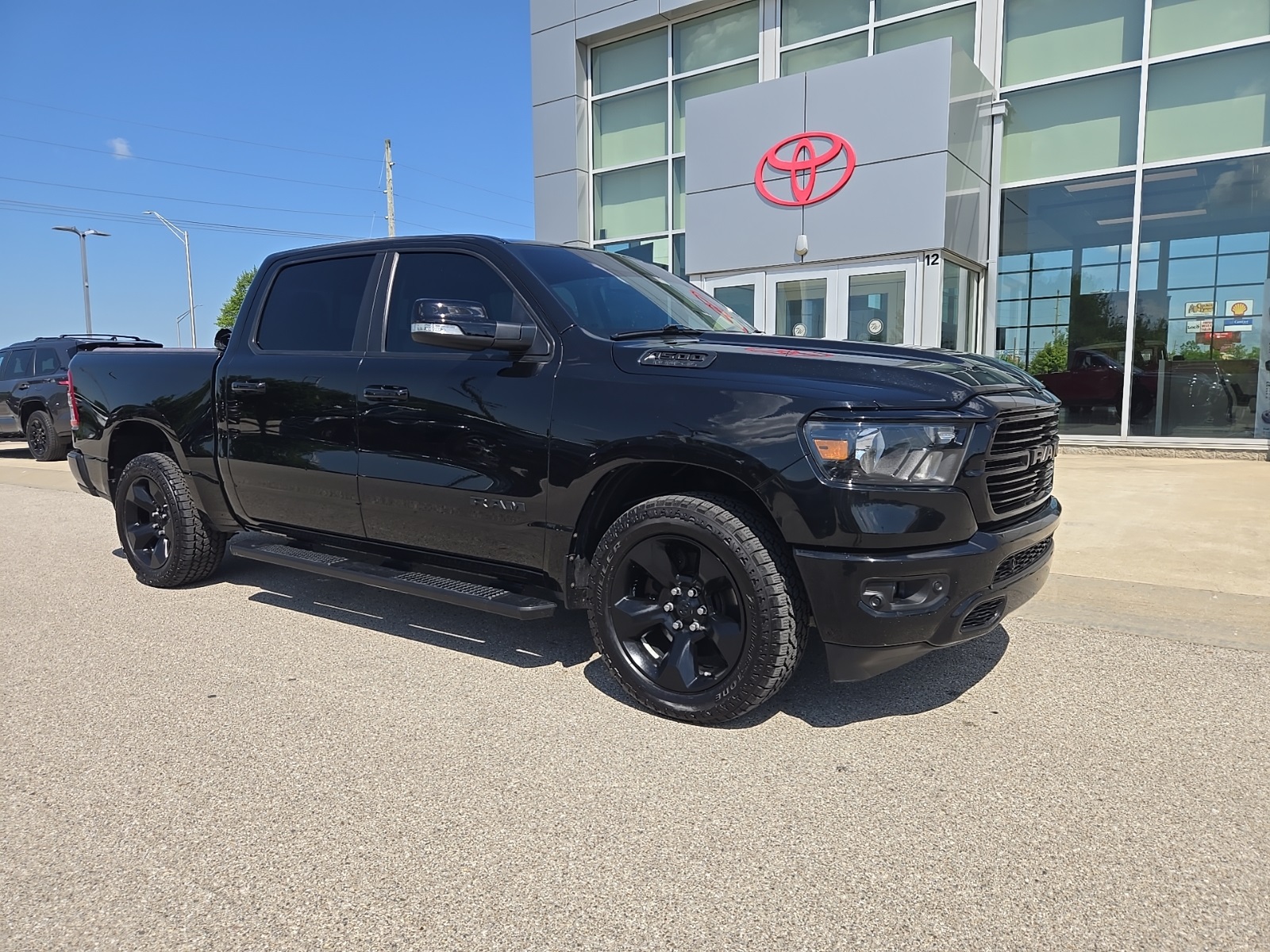 used 2019 Ram 1500 car, priced at $27,068