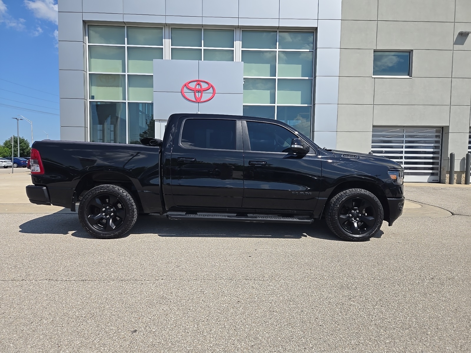 used 2019 Ram 1500 car, priced at $27,068