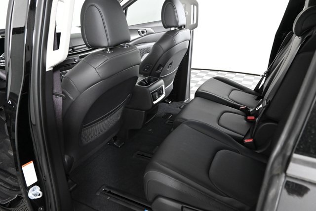 new 2025 Kia Carnival Hybrid car, priced at $49,604