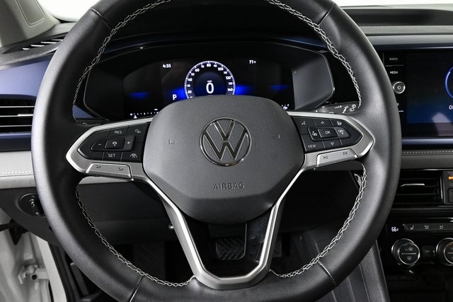 used 2024 Volkswagen Taos car, priced at $24,100