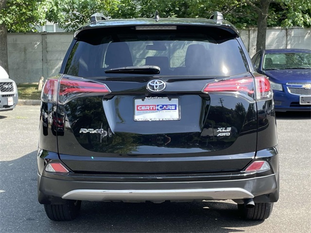 used 2018 Toyota RAV4 car, priced at $19,247