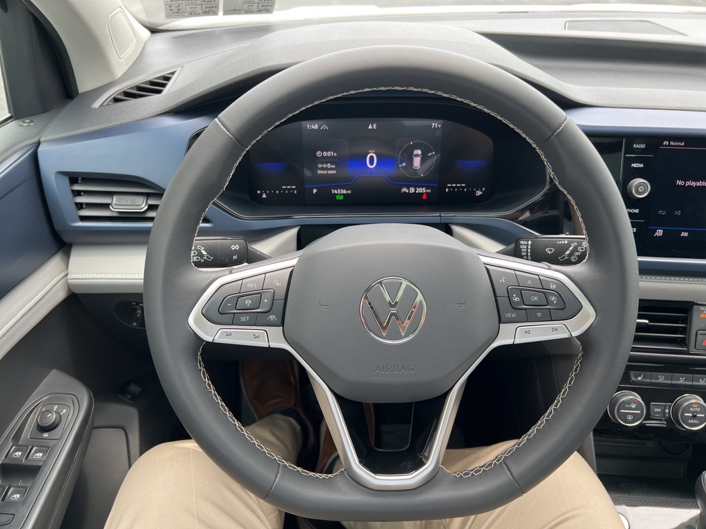 used 2024 Volkswagen Taos car, priced at $24,900