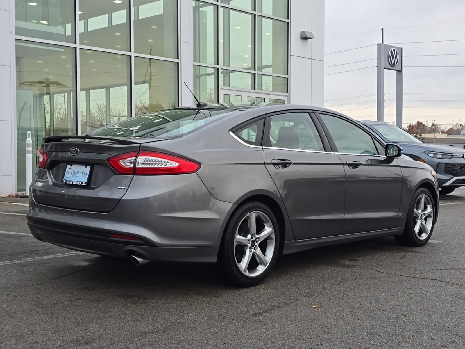 used 2014 Ford Fusion car, priced at $9,000