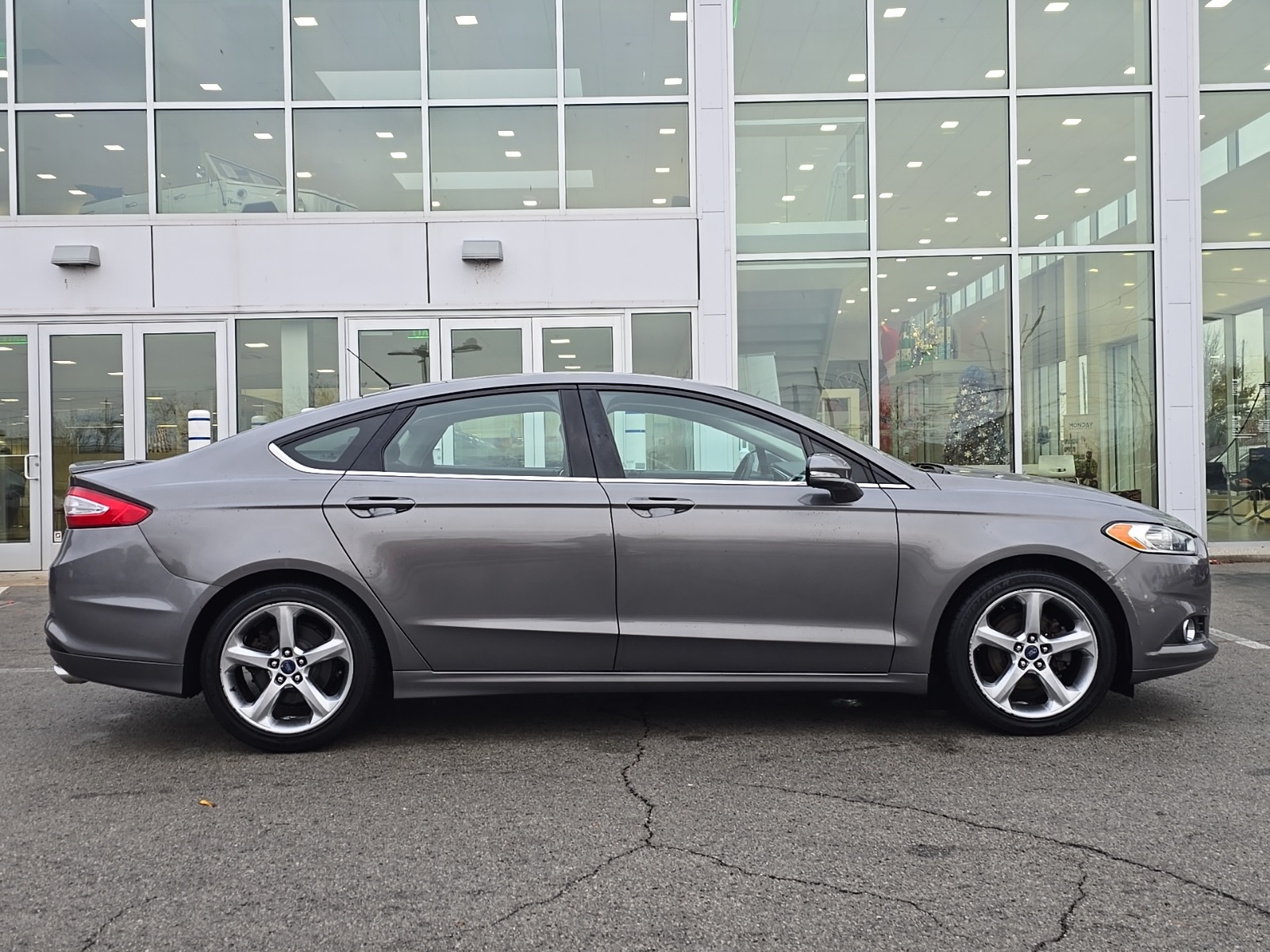 used 2014 Ford Fusion car, priced at $9,000