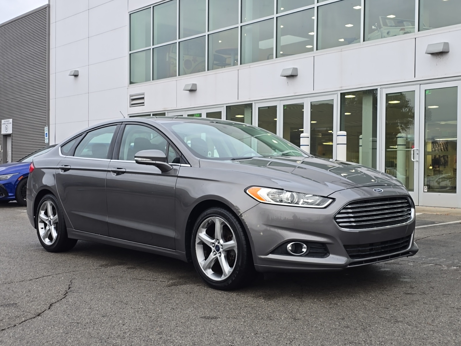 used 2014 Ford Fusion car, priced at $9,000