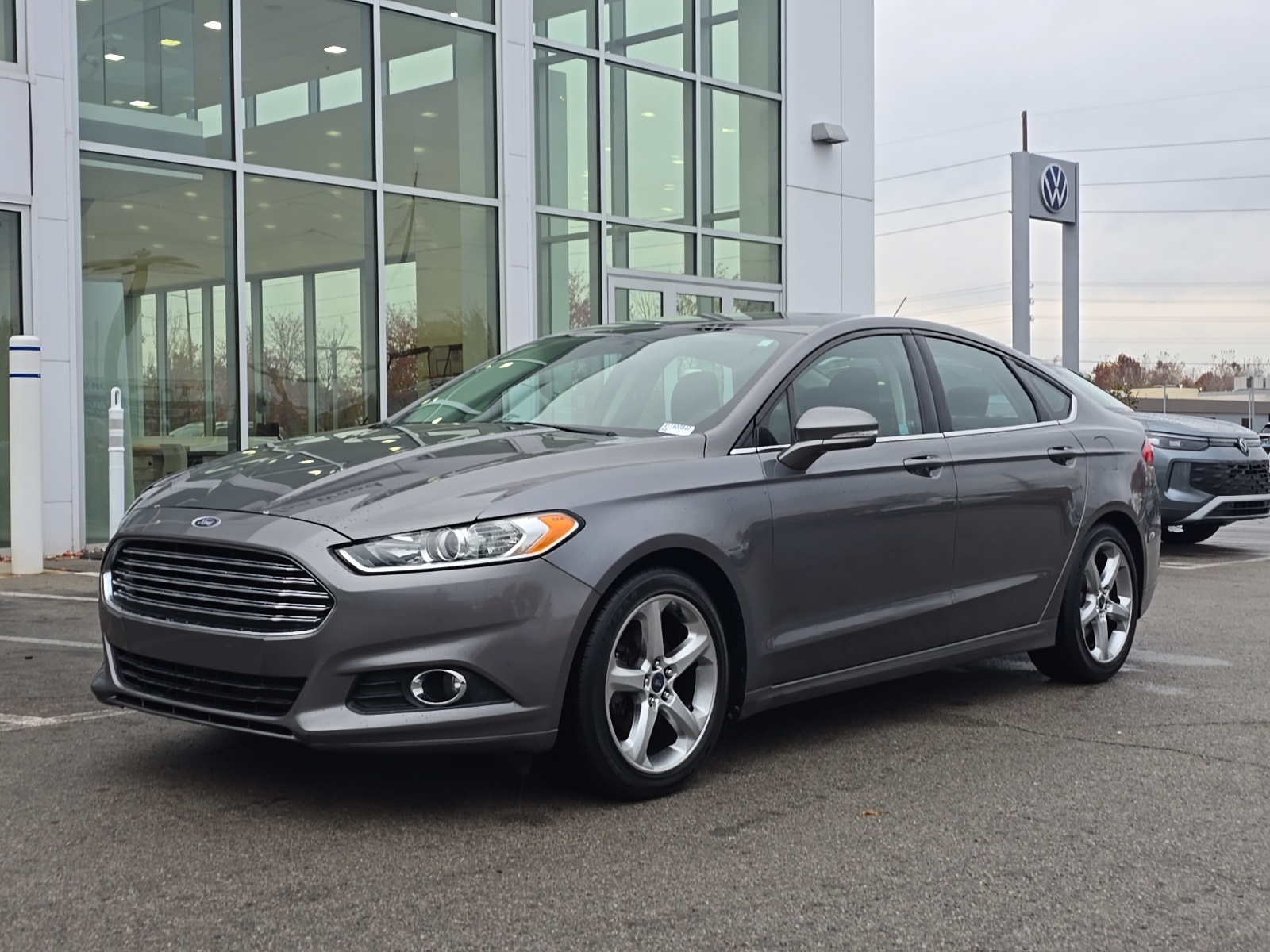used 2014 Ford Fusion car, priced at $9,000