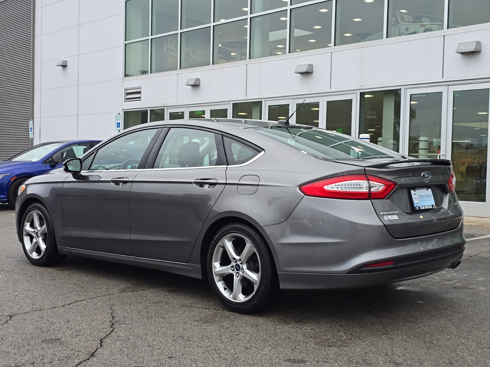 used 2014 Ford Fusion car, priced at $9,000
