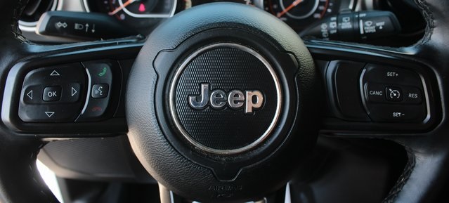 used 2021 Jeep Wrangler car, priced at $29,677