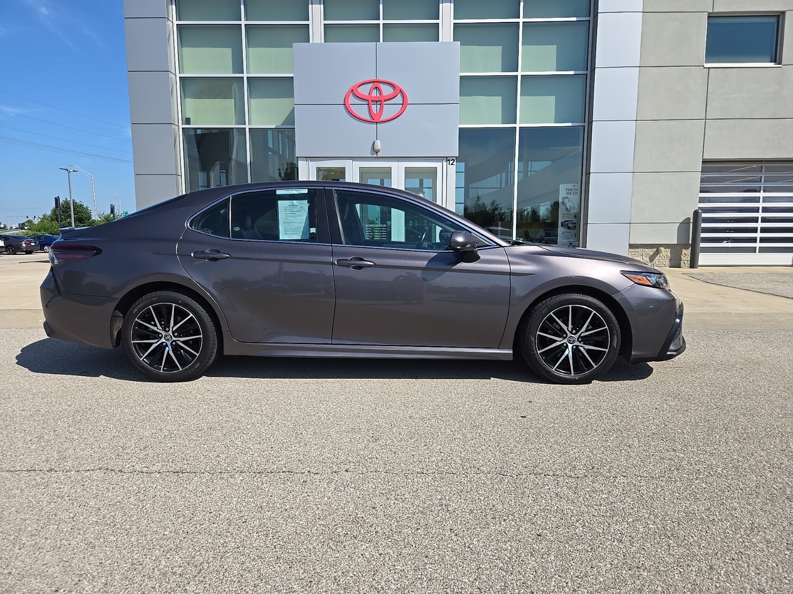 used 2021 Toyota Camry car, priced at $19,607