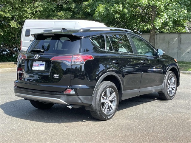 used 2018 Toyota RAV4 car, priced at $19,247