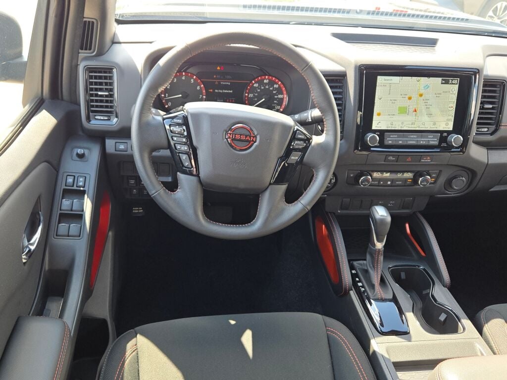 used 2024 Nissan Frontier car, priced at $38,000