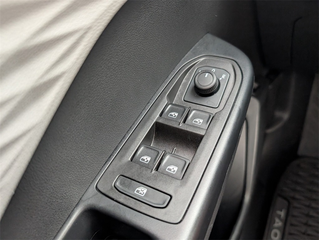 used 2024 Volkswagen Taos car, priced at $18,000