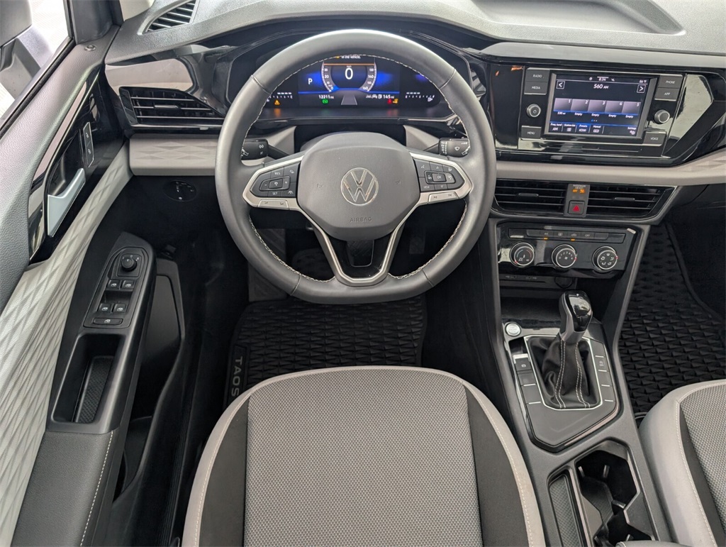 used 2024 Volkswagen Taos car, priced at $18,000