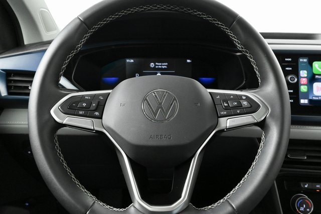 used 2023 Volkswagen Taos car, priced at $23,900