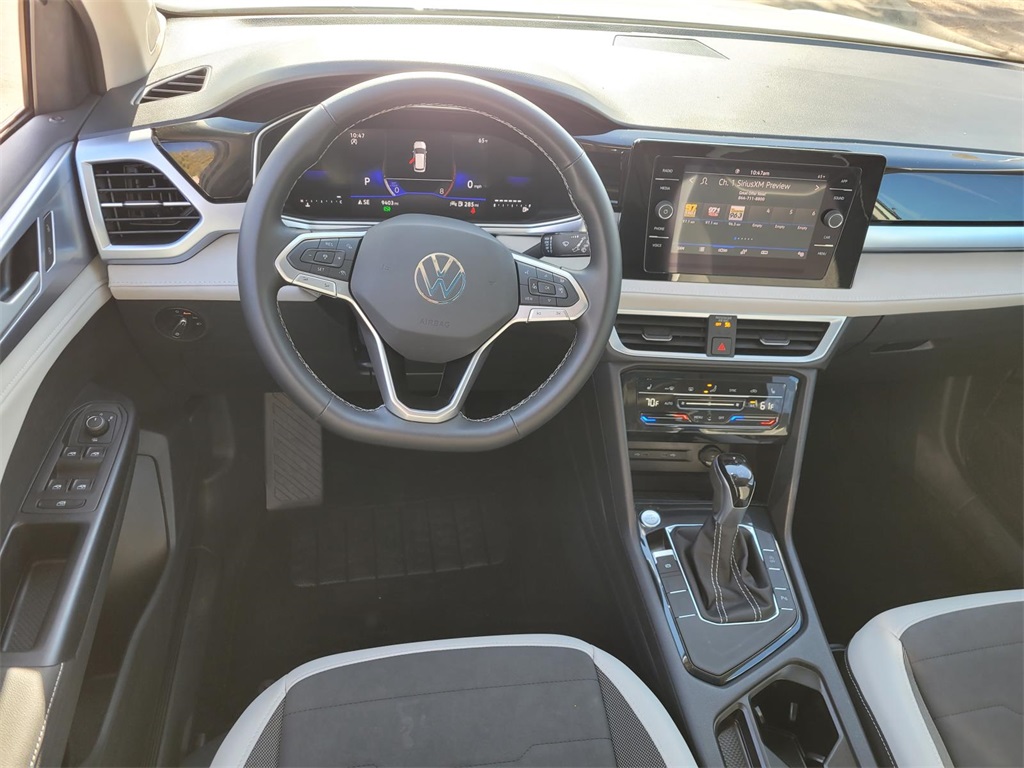 used 2025 Volkswagen Taos car, priced at $26,882