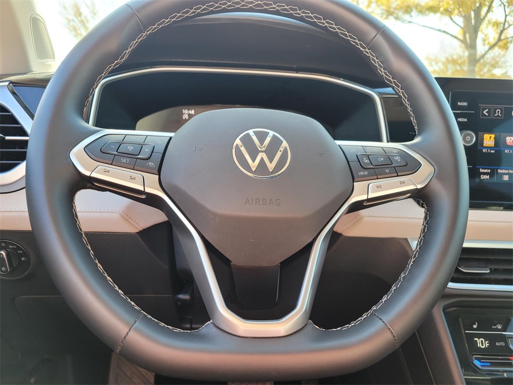 used 2025 Volkswagen Taos car, priced at $26,882